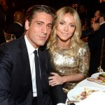 David Muir and Kelly Ripa smiling at the 6th Annual Save the Children Illumination Gala at the American Museum of Natural History in November 2018 in New York City